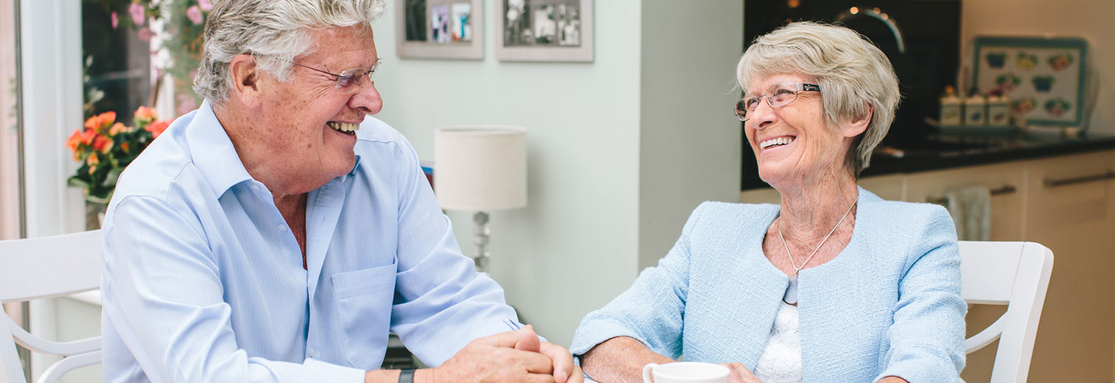 elderly couple laughing